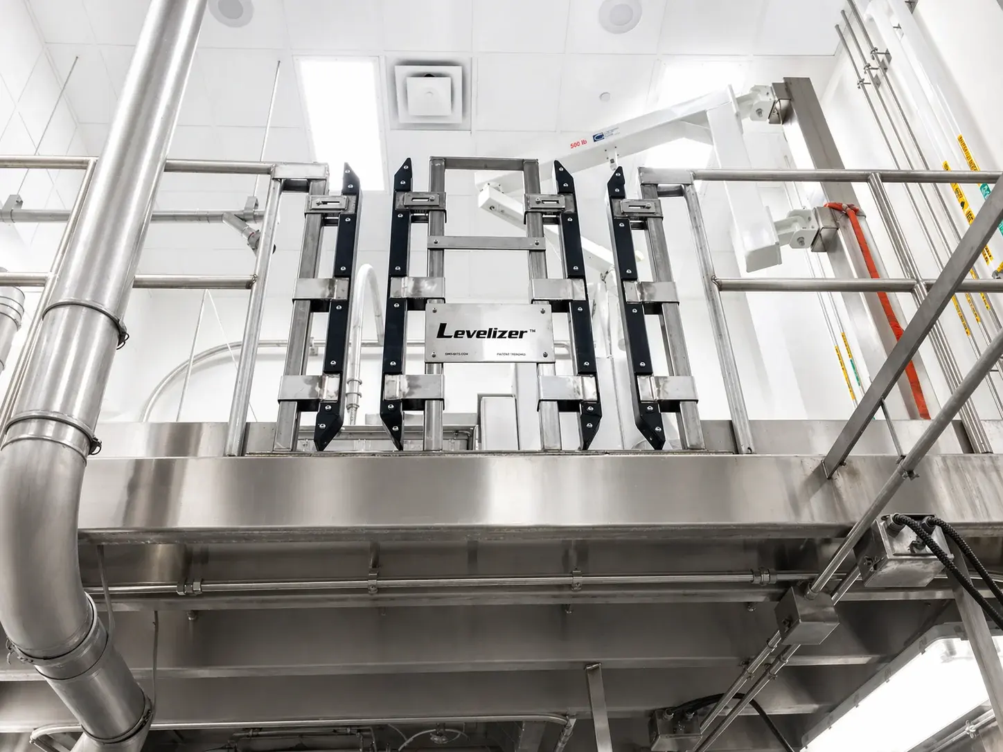 Levelizer® safety gate installed at a mezzanine pallet drop zone